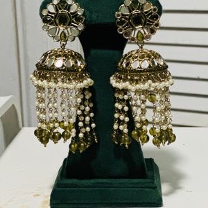 Earrings with tikk